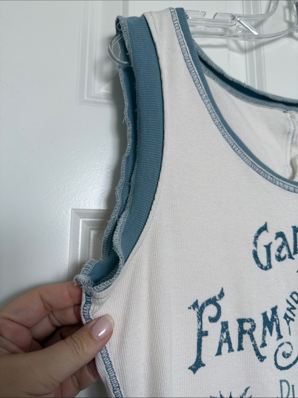 Pilcro Cream Tank Top with Blue Trim and Orange Floral Graphic - Picture 6 of 7